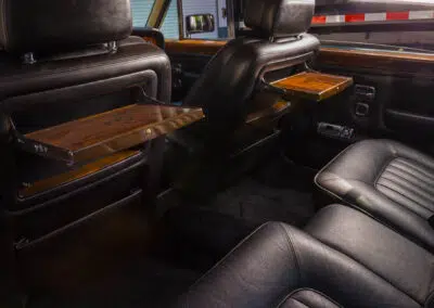 White Rolls Royce interior in passenger compartment.