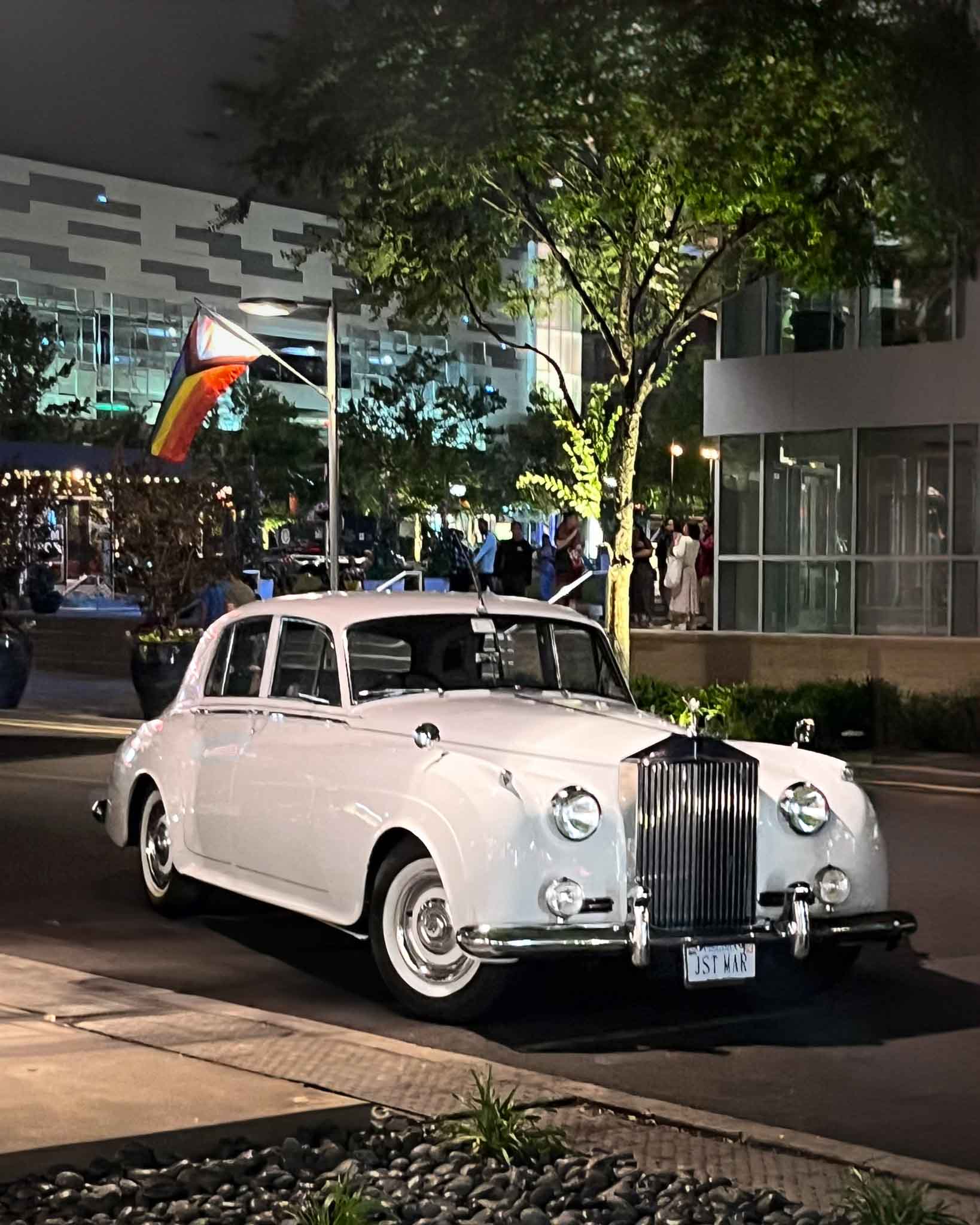 Photo of our white 1956 Rolls-Royce in front of the 2941 Restaurant in Fair Oaks